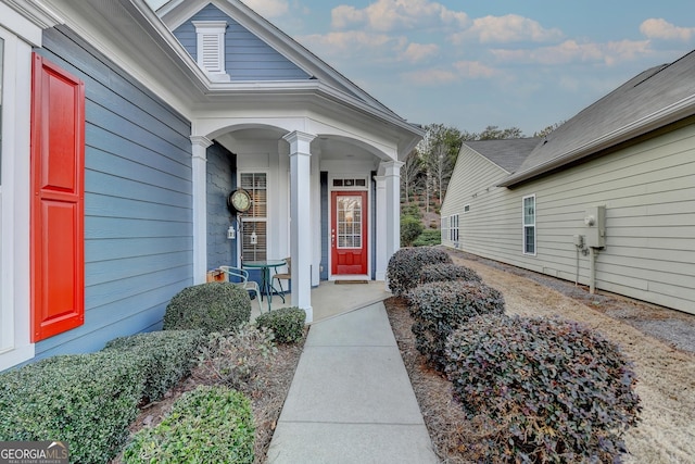 property entrance featuring covered porch