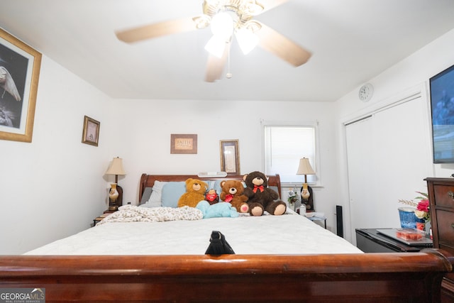 bedroom featuring a ceiling fan and a closet