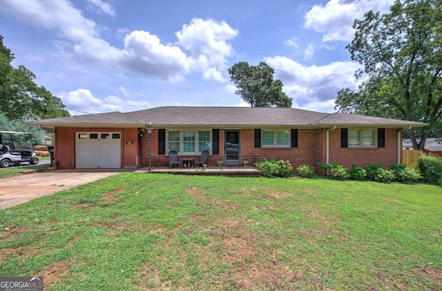 ranch-style house with brick siding, driveway, a garage, and a front yard