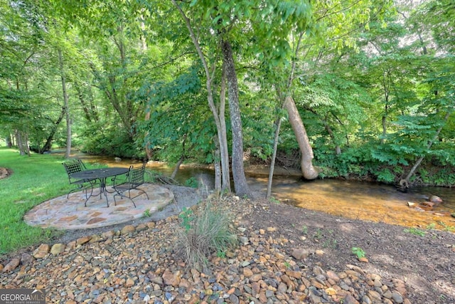 153 Falls Creek Dr, Hiawassee, GA 30546 - view of grassy yard featuring a patio area