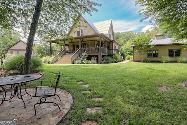 153 Falls Creek Dr, Hiawassee, GA 30546 - rear view of property with a lawn, a metal roof, stairway, a ceiling fan, and a patio