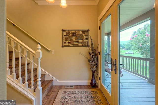 153 Falls Creek Dr, Hiawassee, GA 30546 - entrance foyer featuring wood finished floors, french doors, and stairs