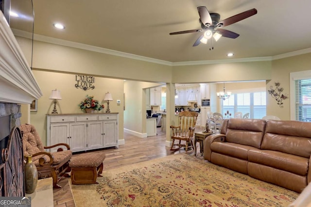 153 Falls Creek Dr, Hiawassee, GA 30546 - living room with ceiling fan, a chandelier, ornamental molding, light wood-type flooring, and recessed lighting
