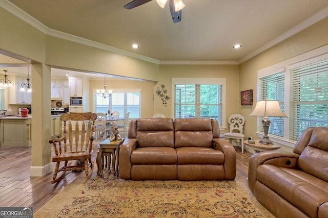 153 Falls Creek Dr, Hiawassee, GA 30546 - living area with a chandelier, light wood-type flooring, a ceiling fan, recessed lighting, and crown molding