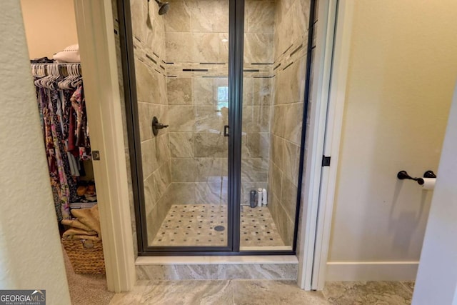 153 Falls Creek Dr, Hiawassee, GA 30546 - bathroom with a shower stall and a walk in closet