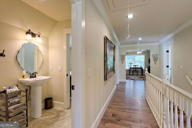 153 Falls Creek Dr, Hiawassee, GA 30546 - hallway with attic access, ornamental molding, light wood finished floors, and recessed lighting