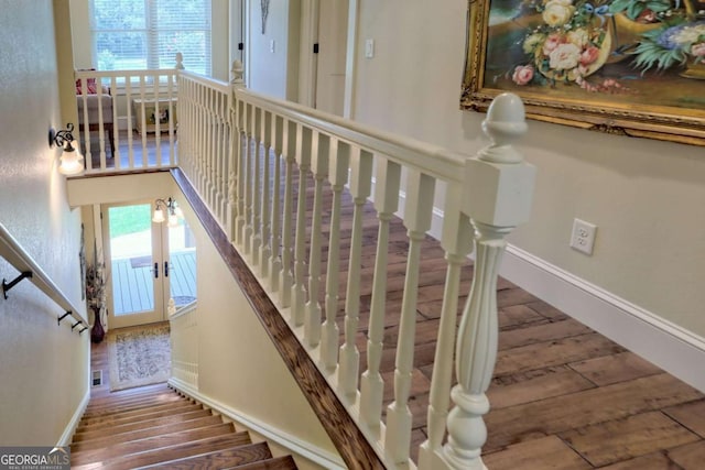 153 Falls Creek Dr, Hiawassee, GA 30546 - stairway with wood-type flooring, plenty of natural light, and french doors