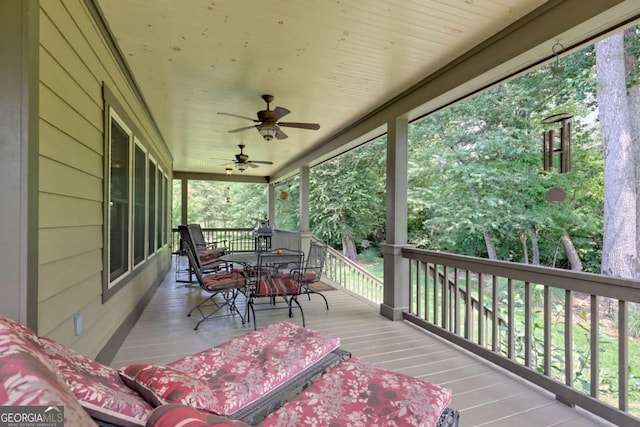 153 Falls Creek Dr, Hiawassee, GA 30546 - wooden terrace with outdoor dining space and ceiling fan