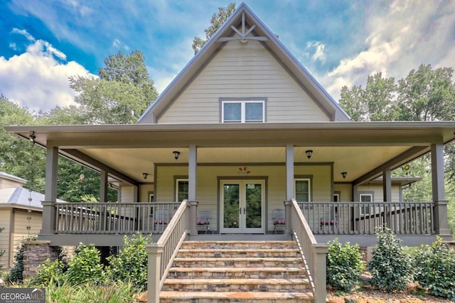 153 Falls Creek Dr, Hiawassee, GA 30546 - farmhouse featuring a porch and french doors