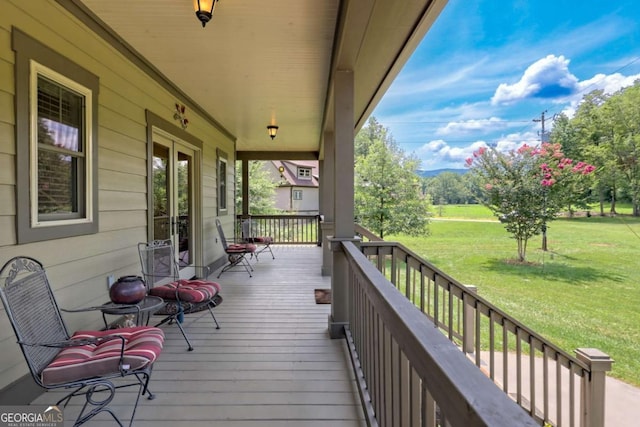 153 Falls Creek Dr, Hiawassee, GA 30546 - wooden porch with a lawn