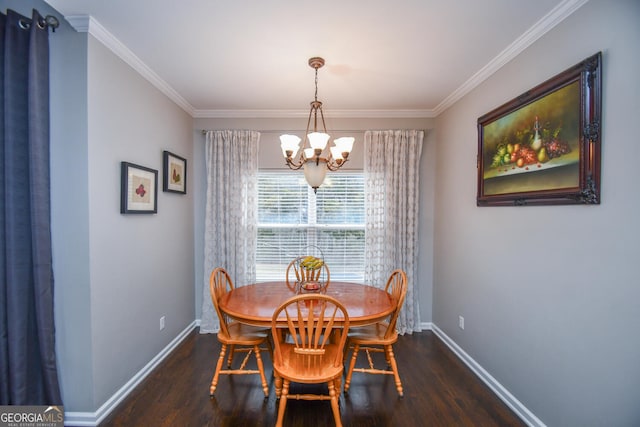 dining area featuring a chandelier, dark wood-style flooring, ornamental molding, and baseboards