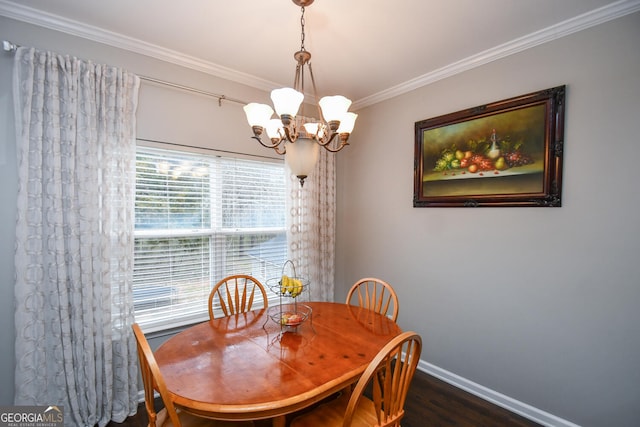 dining room with baseboards, dark wood-style floors, a chandelier, and crown molding