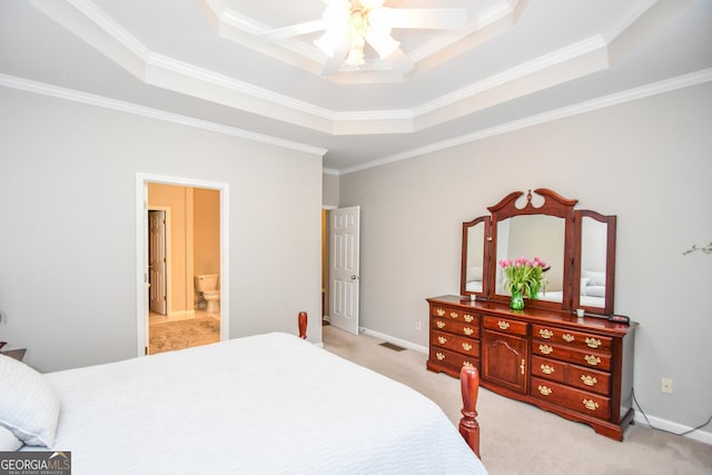 bedroom featuring ornamental molding, a raised ceiling, light carpet, and baseboards