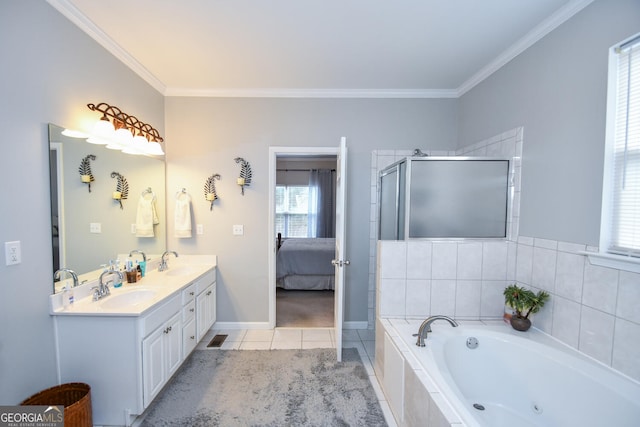 bathroom with tile patterned flooring, crown molding, a sink, and ensuite bathroom