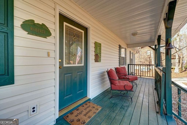 wooden terrace with covered porch