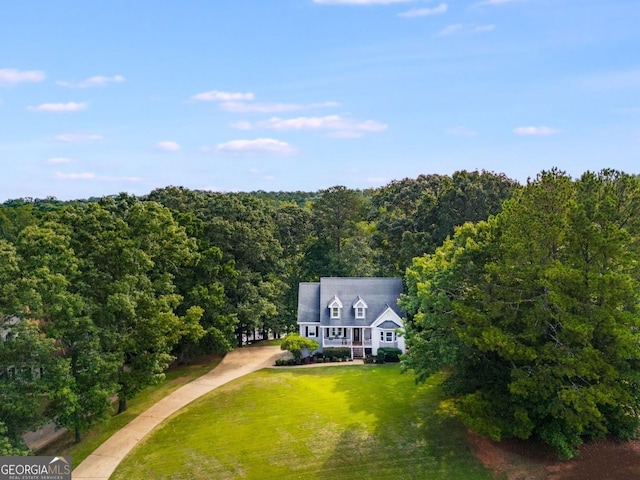 aerial view with a wooded view