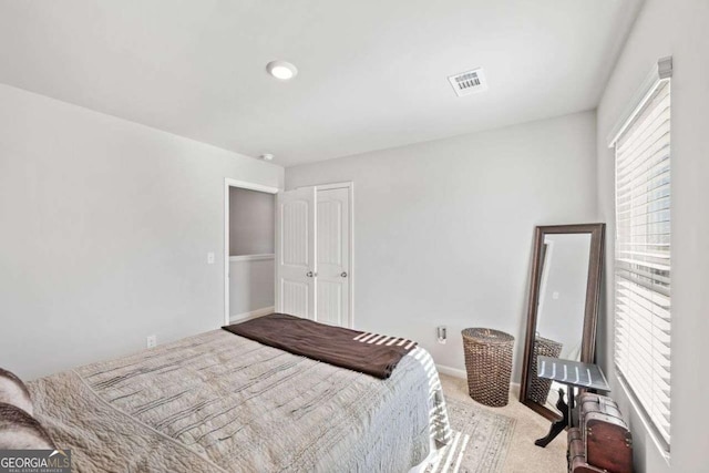 6713 Moondancer Ct, Flowery Branch, GA 30542 - bedroom with light carpet and a closet