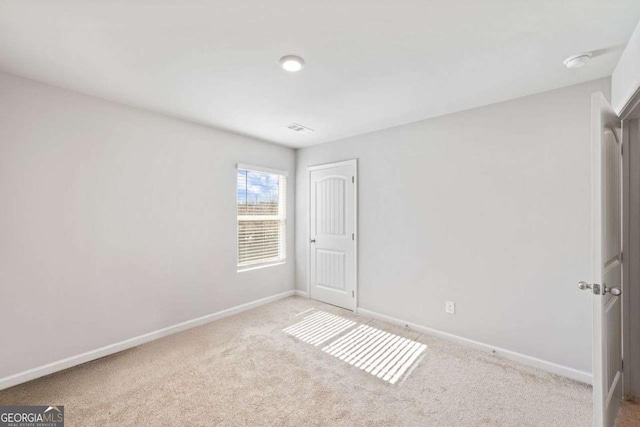 6713 Moondancer Ct, Flowery Branch, GA 30542 - carpeted spare room with baseboards and a smoke detector