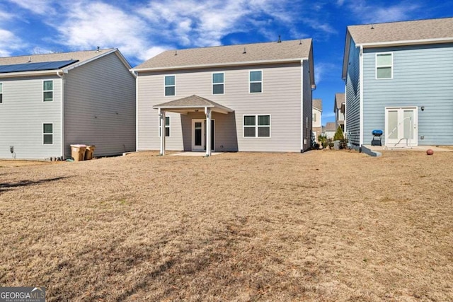 6713 Moondancer Ct, Flowery Branch, GA 30542 - rear view of property with a patio area