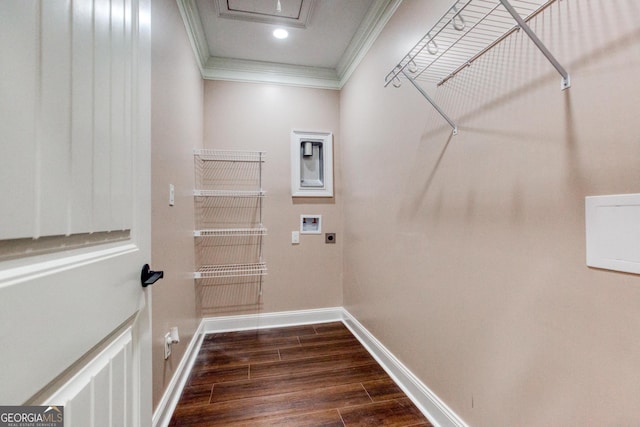 laundry area with crown molding, laundry area, hookup for a washing machine, dark wood-type flooring, and baseboards
