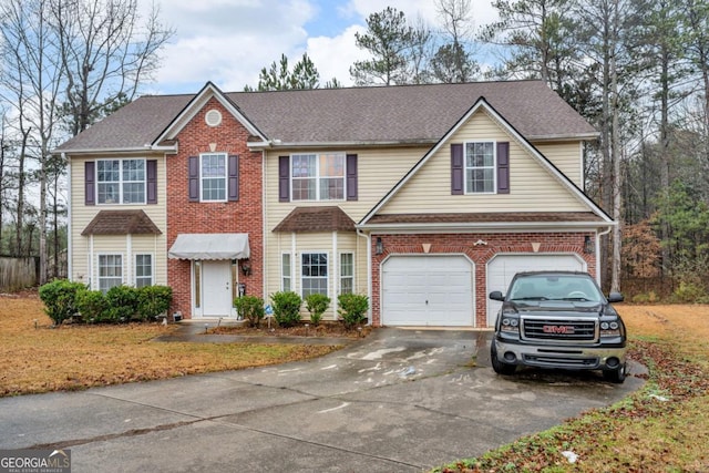 view of front of home featuring a garage, brick siding, driveway, and roof with shingles