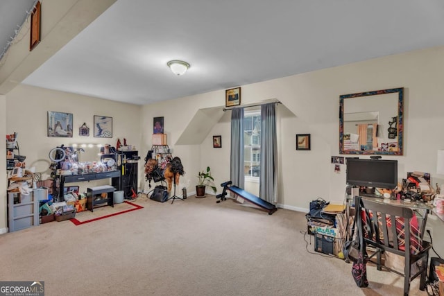 workout area with carpet floors and baseboards