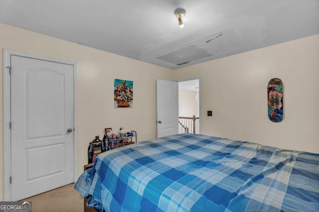 carpeted bedroom with visible vents