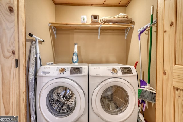 laundry room featuring laundry area and washer and clothes dryer