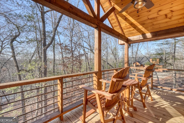 wooden deck with ceiling fan