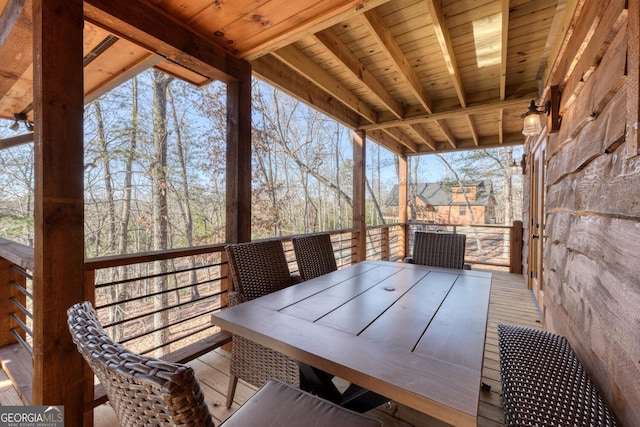 deck featuring outdoor dining area