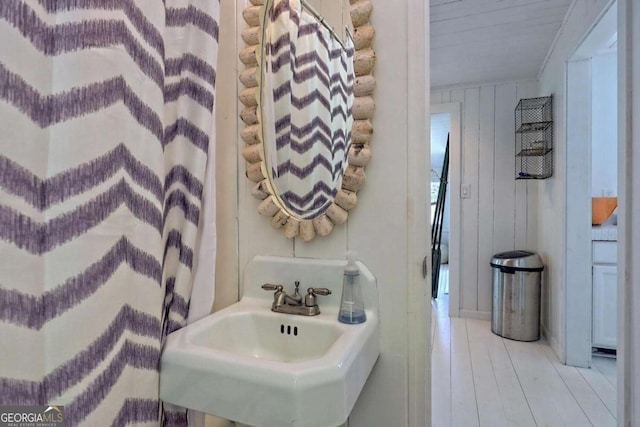 bathroom featuring a sink and wood finished floors