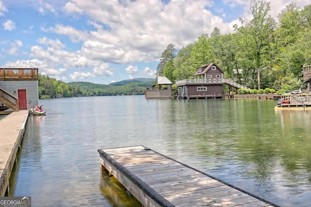 dock area featuring a gazebo and a water view