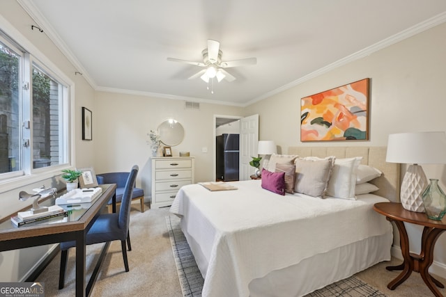 bedroom with ceiling fan, visible vents, crown molding, and light colored carpet