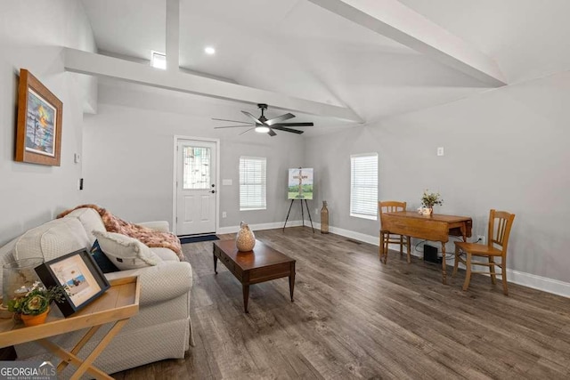 living area with high vaulted ceiling, dark wood-style flooring, a ceiling fan, and baseboards