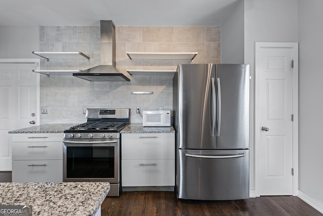 kitchen featuring light stone counters, open shelves, appliances with stainless steel finishes, white cabinets, and ventilation hood