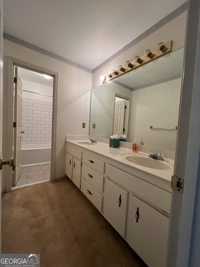 full bathroom featuring double vanity, carpet, a sink, and washtub / shower combination