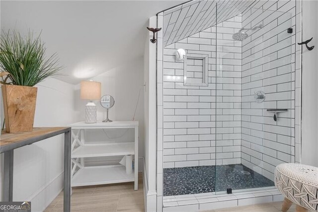 full bathroom with a shower stall