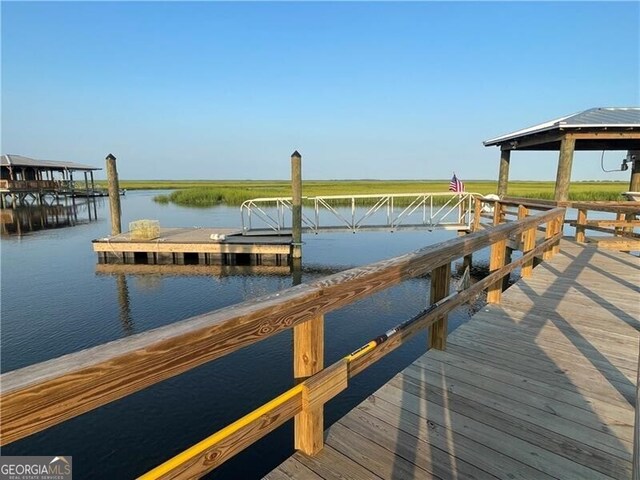 view of dock with a water view