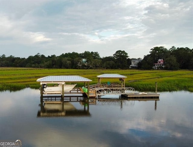 dock area featuring a water view