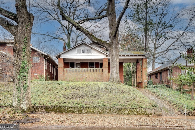 view of front of home with brick siding