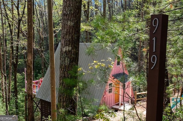 exterior space featuring metal roof