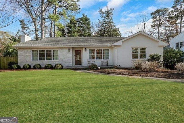 ranch-style house with stone siding, a front lawn, a chimney, and stucco siding