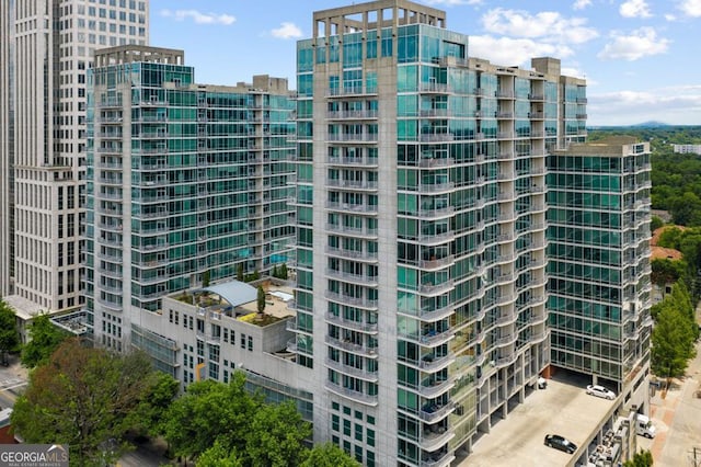 view of building exterior featuring a city view