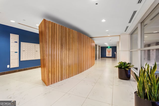 corridor featuring visible vents, marble finish floor, mail area, and recessed lighting