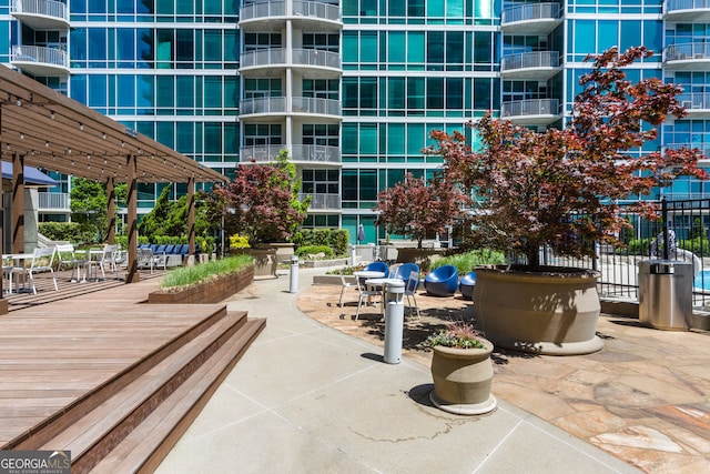 view of property's community featuring a pergola