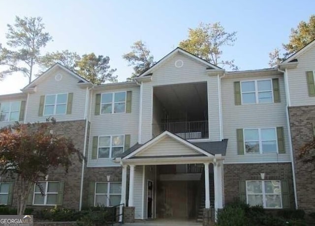 view of property featuring a balcony