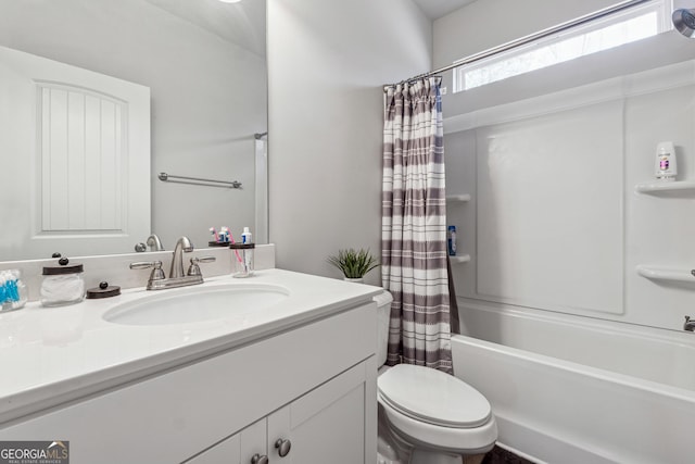 full bath featuring toilet, vanity, and shower / bathtub combination with curtain