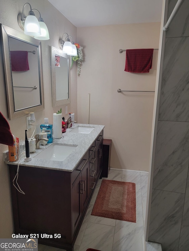 2335 Boulder Rd SE, Atlanta, GA 30316 - bathroom with marble finish floor, double vanity, and a sink