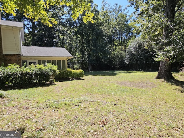 view of yard with fence