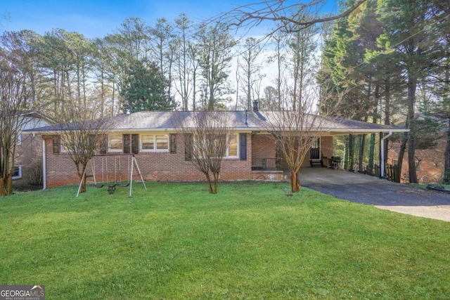 ranch-style house with driveway, brick siding, an attached carport, and a front yard